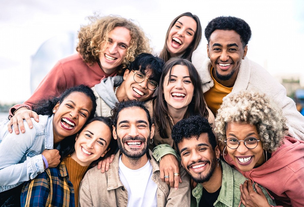 happy group of young people smiling together